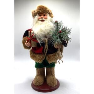 Vintage Santa Claus/St. Nicholas figurine Holding present Approx 12" Tall